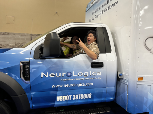 CAR - customer drving truck on tradeshow floor